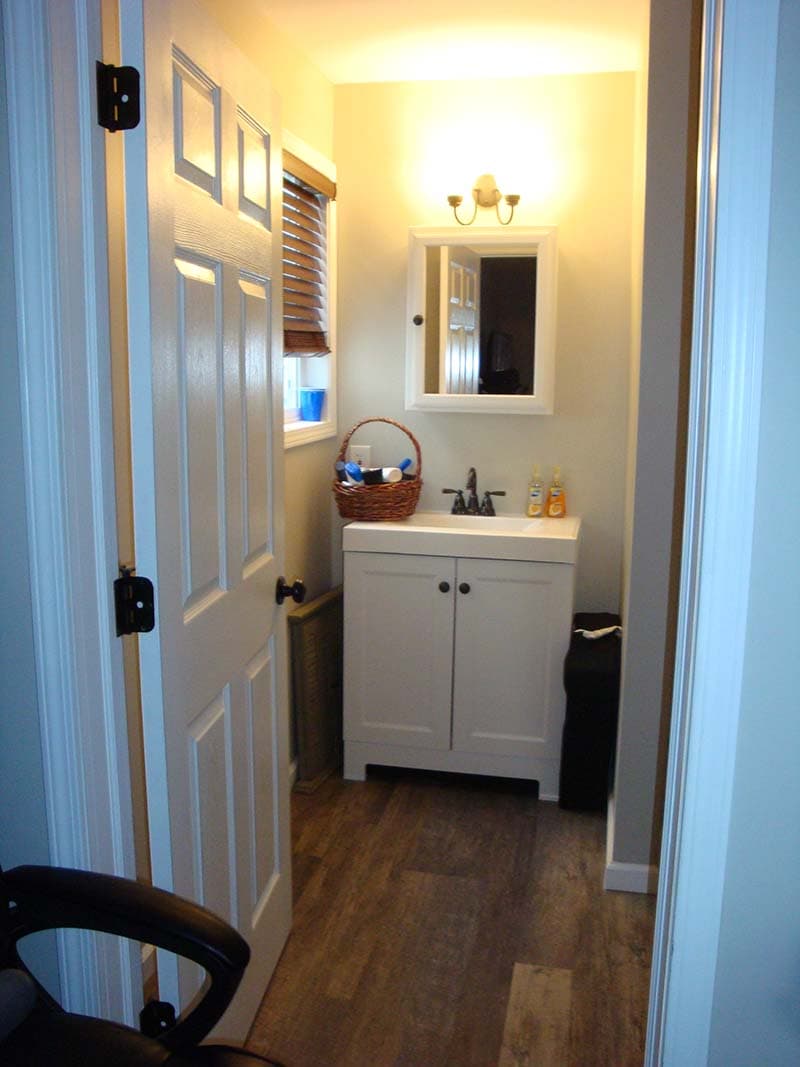 bathroom vanity before a remodel by CorHome