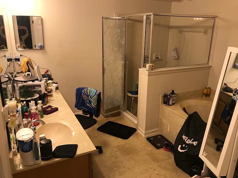 bathroom with sink tub and walk-in shower before a remodel by CorHome