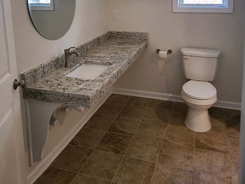 bathroom toilet and sink after a remodel by CorHome