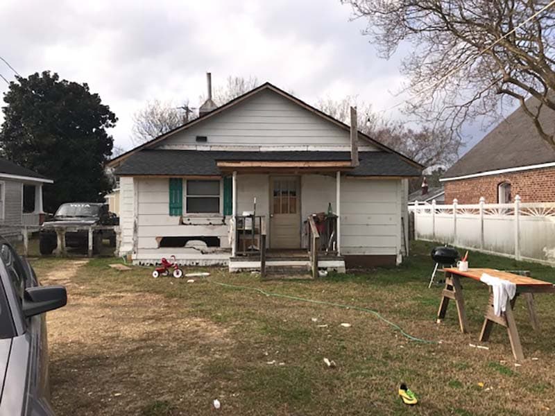 home with run down exterior before a remodel by CorHome